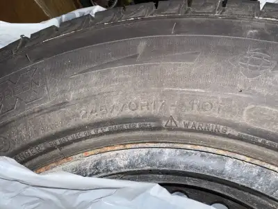 4 tires - really great tread life Michelin X Ice