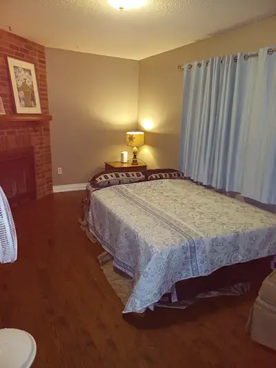 GROUND FLOOR LARGE ROOM FOR RENT IN A DETACHED HOUSE with shared Bathroom and kitchen and On site La...