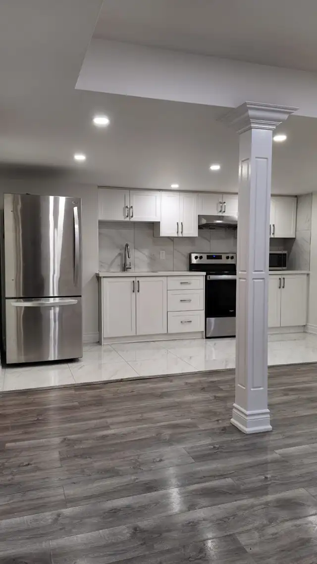 Bright & Spacious 2-Bedroom + Den Basement Apartment – 2 Parking
