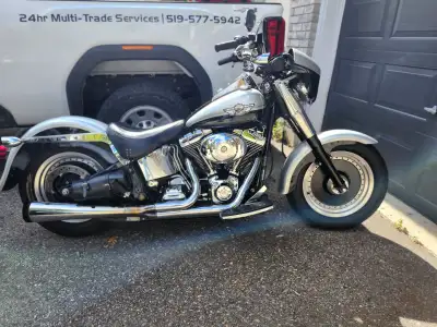 2003 fatboy, many small visual modifications, lowered rear end, 1/4 fairing, kuryaken sound bar, 98"...