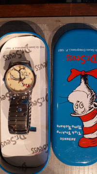 DR Seuss  wrist watch  new mint condition in tin protective .