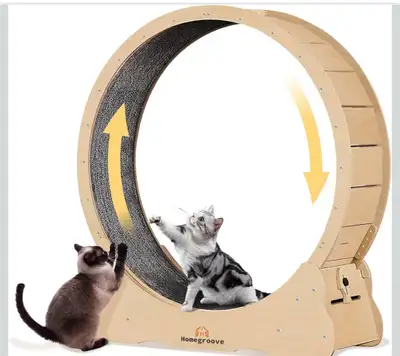 This is a nearly new Homegroove cat exercise wheel to keep your feline friend active and entertained...