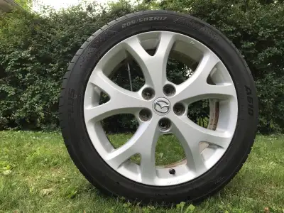 4x Mazda 17” mags (5x114.3mm) avec pneus toutes saisons Aplus A610 205/50ZR17 en très bon condition....