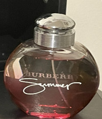 2 bottles of Burberry perfume and a charm bracelets