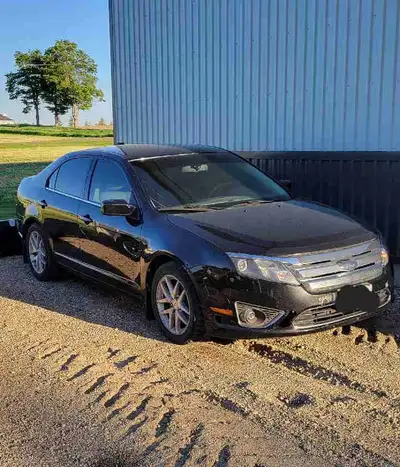 2010 Ford Fusion SEL features leather interior, exterior shows signs of normal wear & tear, currentl...
