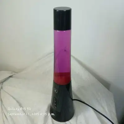 This Lava Lamp comes equipped with a Bluetooth speaker, perfect for setting a groovy mood! Please no...
