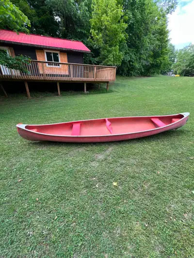 Used canoe in good condition with no leaks. Super stable with two seats and a yolk.