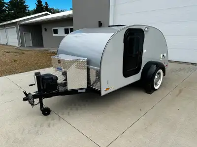 Immaculate condition Little Guy Teardrop Trailer. Always stored inside. Rear kitchen with sink and p...
