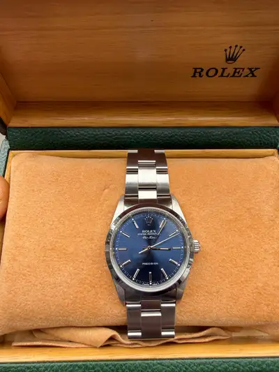 This Rolex Oyster Perpetual Precision is a timeless piece that combines elegance and functionality....