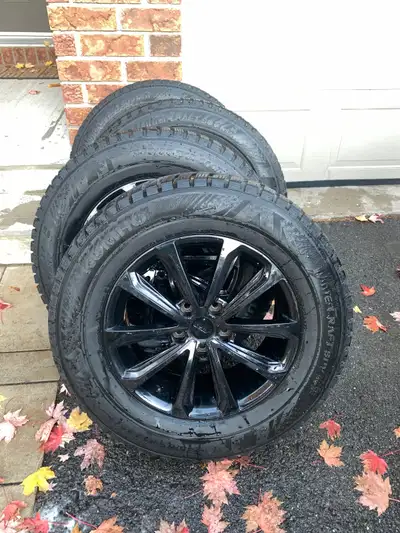 Studded winter tires and mags (Honda Ridgeline) 245/65/17 Used 2 winters Bolt pattern 5X120