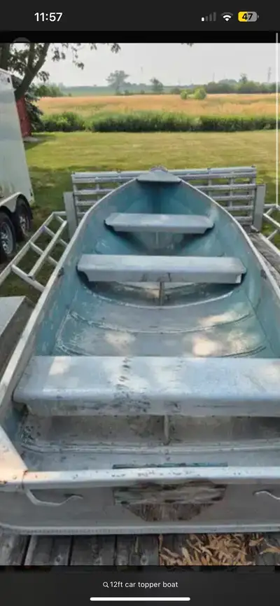 I have a small car topper 12 ft aluminum very light Located in grand beach 500 obo I will get more p...