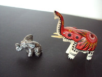 2 SMALL ELEPHANTS 1 HAND CARVED WOOD AND 1 PEWTER