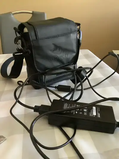 This is a used Inogen Rove 6 portable oxygen concentrator, perfect for those needing supplemental ox...