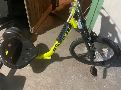 Razor drift trike. Seat is adjustable so suitable for many sizes.