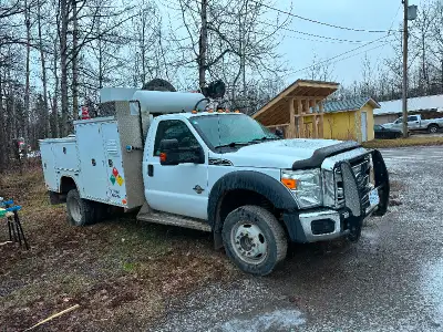 Service truck with Westland service body 5000 auto crane 70 CFM under hood VMA compressor American E...