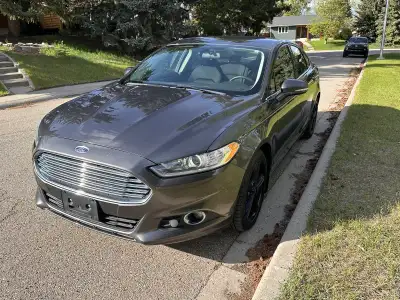 2016 Ford Fusion SE, mileage 75,000 km, all wheel drive, dark grey with 201 Appearance Package (prem...