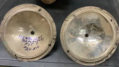 One pair of silver plated head light reflectors for the old bulb style headlights used on pre-World...