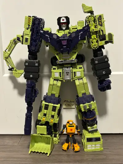 Masterpiece Scale Constructicons combine to form Devastator. Toyworld TW-C07 Combined Height is 23”....