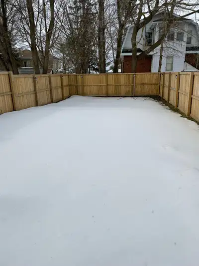 2 bedroom main floor apartment private 2 car driveway fenced in backyard side deck in floor gas heat...