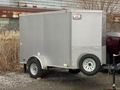 Like new 5x8 plus “V” enclosed trailer with new tires and rims all around in the Fall, Galvanized Ri...