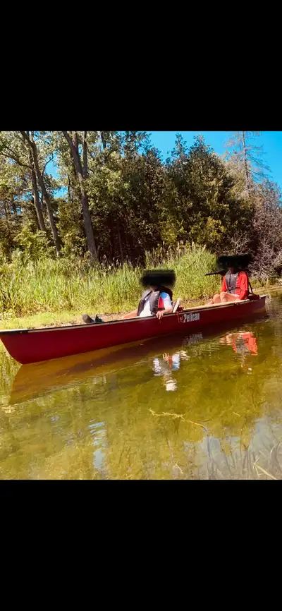 Pelican canoe, trolling motor, has motor mount, battery (for charging), 2 oars, anchor, safety kit,...