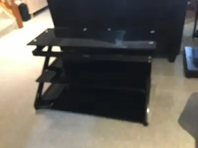 Glass Tv stand 22” high. 40” wide