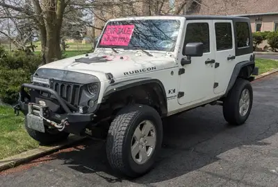 Off road ready Jeep. Raised 4 inches with winch and winter tires. Heavy duty bumpers. Upgraded sound...