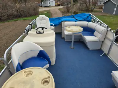 Great pontoon boat for sale. 21 foot long Single axle trailer Live well Sonar included 60 HP EFI fou...
