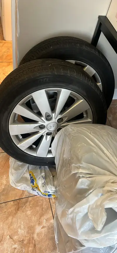 Set of 4 mounted Laufenn 215/55R17 94H M+S low profile tires on OEM Hyundai 17” alloy rims that came...