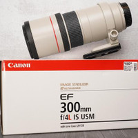 like new canon 300 f4 L IS USM telephoto lens in box and 7d ii