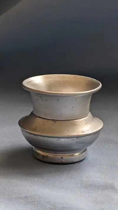 Vintage Aluminum Toothpick Holder. Height - 1 7/8 inches Diameter at top - 2 inches Diameter at bott...