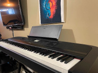 Yamaha DGX 670, 88 weighted keys, keyboard piano, like new.