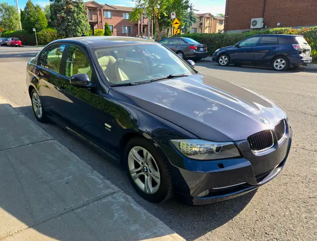 BMW 328i xDrive 2009 – 149,000 km – $5,300