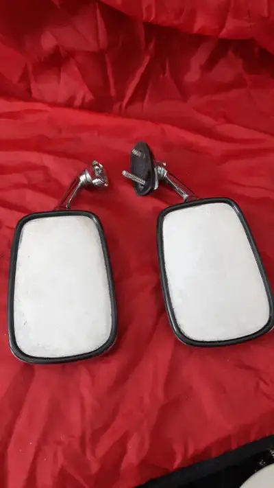 Mirrors $50 New Battery $80 rear bumper and trailer hitch $150 new seat $150 coils $100