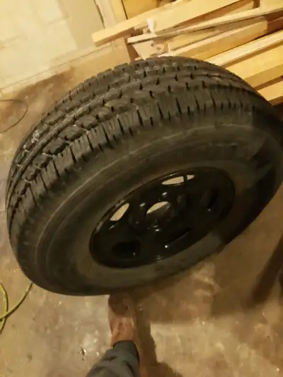 Bridgestoe Dueler A-T 693-11 P265-75R16 1145 MtS tire on cheve steel rim 6 Bolt pattern New never us...