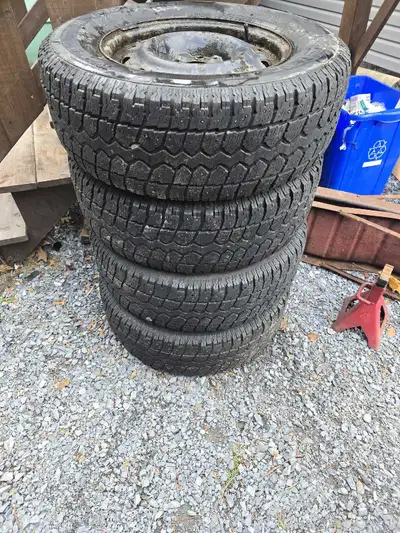 300$ bolt pattern is 5x5. Tires are still in good shape with many of the studs remaining.