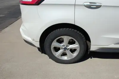 FOR SALE ( 4 wheels complete with excellent snow tires all from ford ) i have used these wheels for...