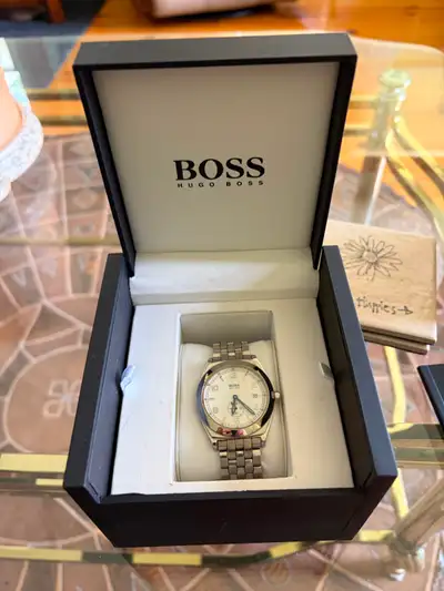 Vintage Bosss 1110 Swiss made watch with stainless steel band, View more