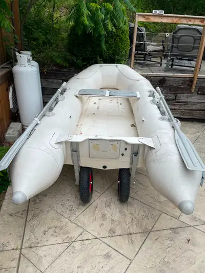 Zodiac for sale. 8ft inflatable rib. Older and repaired but holds air really well. Has removable whe...
