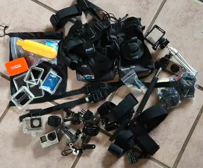 GoPro Hero 4 Bundle! Tons of accessories, chest mount, tri pod, head mounts, floatation, tons of mou...