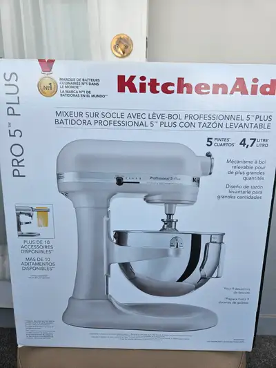 KitchenAid Professional 5™ Plus Series Stand Mixer includes 67-point planetary mixing action. In as...