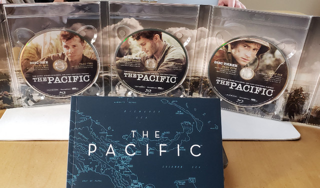 The Pacific Miniseries Blu-ray in Steelcase Tin Case & PhotoBook in CDs, DVDs & Blu-ray in Oakville / Halton Region - Image 3