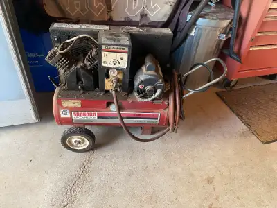 For sale 1 hp 10 gallon tank Sanborn air compressor has handle on wheels with hose 125.00 tillsonbur...