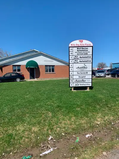 Established business. Convenient, central location in a very busy auto mall. 10’ roll up door, man d...