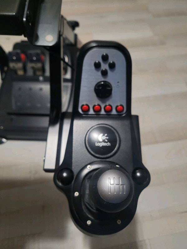 Logitech g27 racing wheel with a adjustable folding metal stand