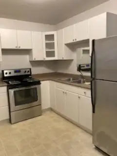 One bedroom bright sunny ground level suite available June 1st in safe well established neighborhood...