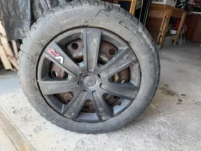 Set of 4 Uniroyal winter tires on steel rims (5 holes) with wheel covers, size 205/55/R16/91T, M+S,...