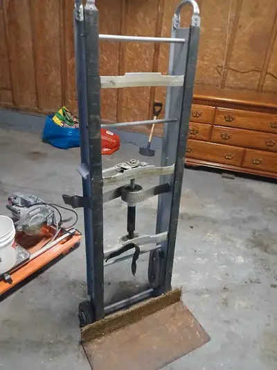 Appliance dolly with ratcheting straps and stair belts. Makes any appliance a one man job. In good w...