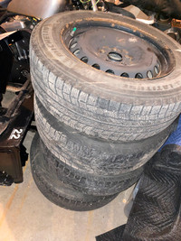 Michelin X-Ice Latitude 235/60 R18 winter tires on rims