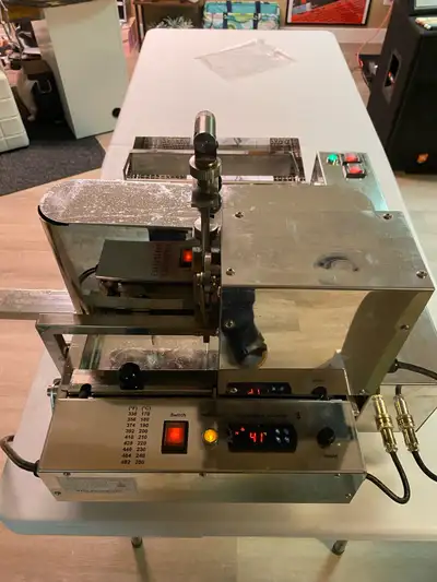 This ALD Kitchen mini donut machine, perfect for commercial or home use, can produce a high volume o...
